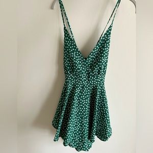 Green Romper with White Floral Details